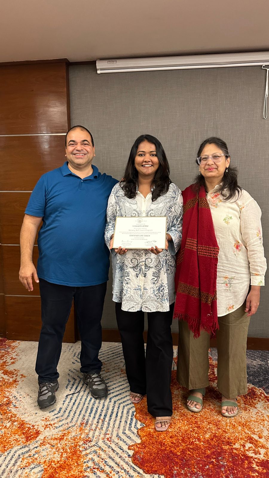Rahath Afroz receiving her Certified Life Coach certificate